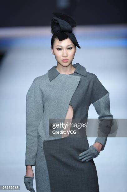Model walks on the catwalk during the Colombina collection show at the 2010 China Fashion Week A/W on March 29, 2010 in Beijing, China.