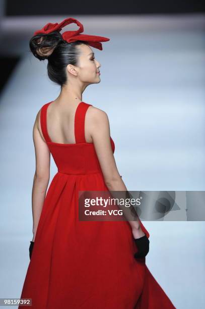 Model walks on the catwalk during the Colombina collection show at the 2010 China Fashion Week A/W on March 29, 2010 in Beijing, China.