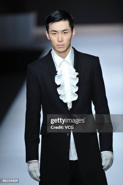 Model walks on the catwalk during the Colombina collection show at the 2010 China Fashion Week A/W on March 29, 2010 in Beijing, China.