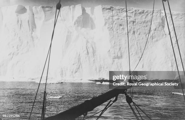 Close under the barrier, Endurance's bow with iceberg in front, Antarctica, 1915. Imperial Trans-Antarctic Expedition 1914-1916 .