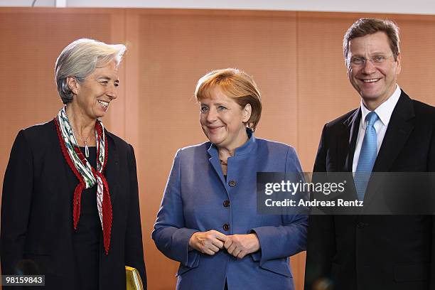 French Minister for Economy, Industry and Employment Christine Lagarde, German Chancellor Angela Merkel and Vice Chancellor and German Foreign...