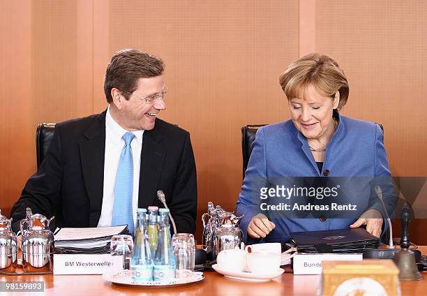 German Chancellor Angela Merkel and Vice Chancellor and German Foreign Minister Guido Westerwelle attend the weekly German government cabinet meeting...