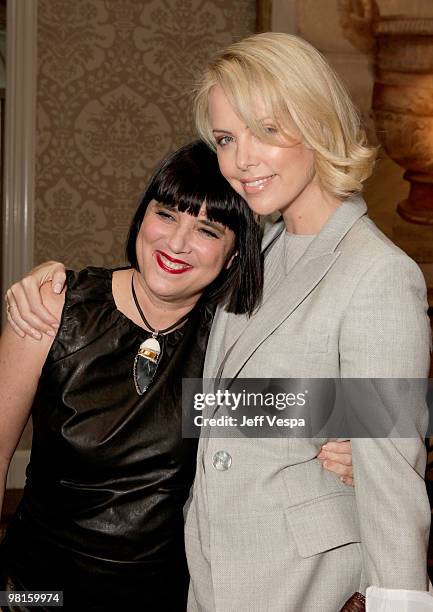 Author/V-Day Founder Eve Ensler and actor Charlize Theron attend V-Day's 4th Annual LA Luncheon featuring a reading of Eve Ensler's newest work "I Am...
