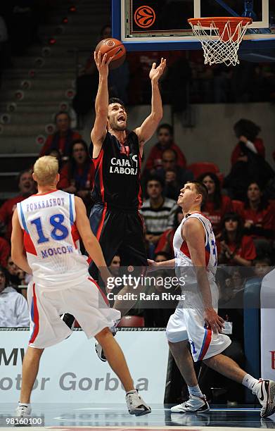 Fernando San Emeterio, #19 of Caja Laboral competes with Viktor Khryapa, #31 of CSKA Moscow during the Euroleague Basketball 2009-2010 Play Off Game...