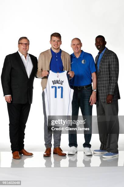 Donnie Nelson Draft Pick Luka Doncic Head Coach Rick Carlise and Michael Finley pose for a portrait at the Post NBA Draft press conference on June...