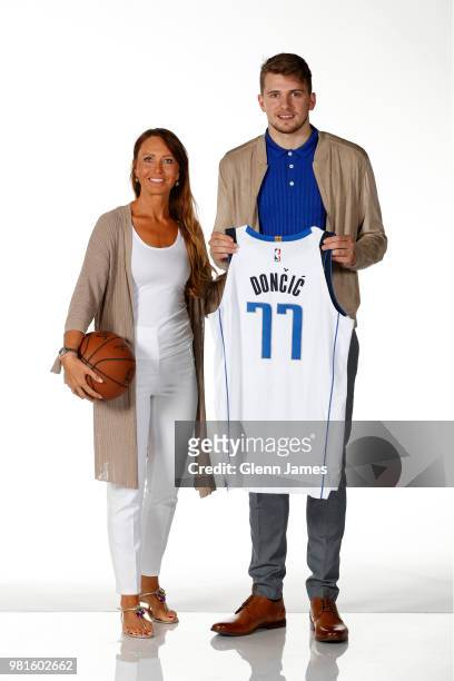 Draft Pick Luka Doncic and his mother pose for a photo at the Post NBA Draft press conference on June 22, 2018 at the American Airlines Center in...