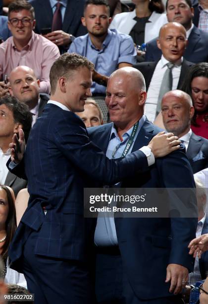 Brady Tkachuk reacts after being selected fourth overall by the Ottawa Senators during the first round of the 2018 NHL Draft at American Airlines...