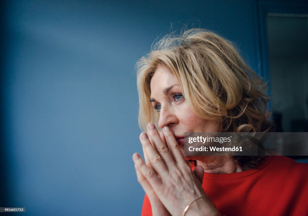 Portrait of thoughtful senior woman