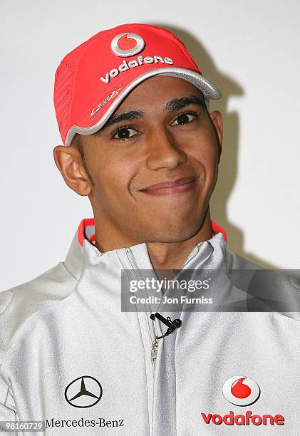 Lewis Hamilton attends a photocall to launch the Mercedes-Benz Driving Academy Roadsense schools initiative on December 6, 2009 in Weybridge, England.