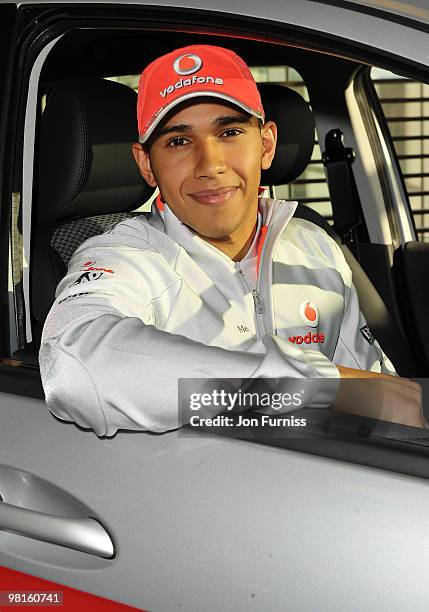 Lewis Hamilton attends a photocall to launch the Mercedes-Benz Driving Academy Roadsense schools initiative on December 6, 2009 in Weybridge, England.