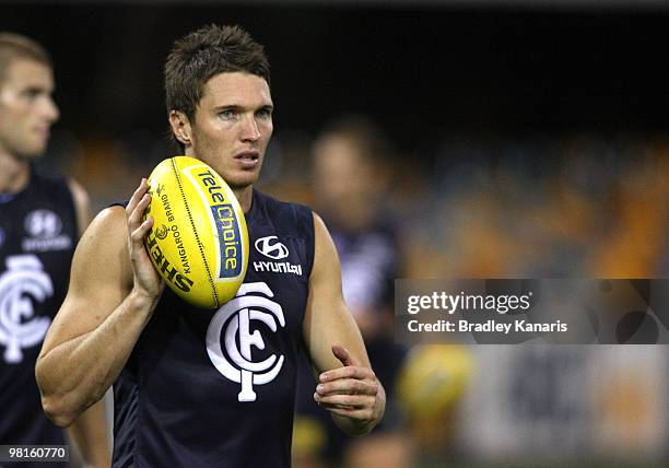 Ryan Houlihan plays with the ball during a Carlton Blues AFL training session at The Gabba on March 31, 2010 in Brisbane, Australia.