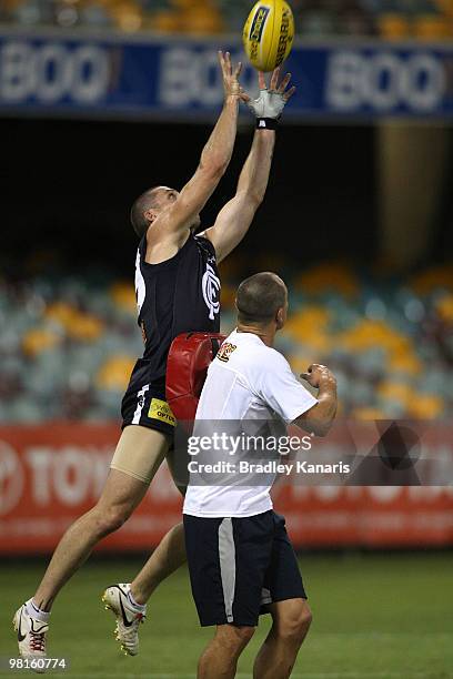 Robert Warnock takes a mark during a training drill at a Carlton Blues AFL training session at The Gabba on March 31, 2010 in Brisbane, Australia.