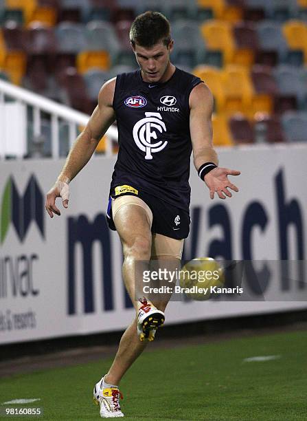 Bryce Gibbs kicks the ball during a Carlton Blues AFL training session at The Gabba on March 31, 2010 in Brisbane, Australia.