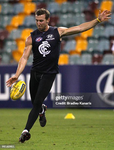 Brock McLean kicks the ball during a Carlton Blues AFL training session at The Gabba on March 31, 2010 in Brisbane, Australia.