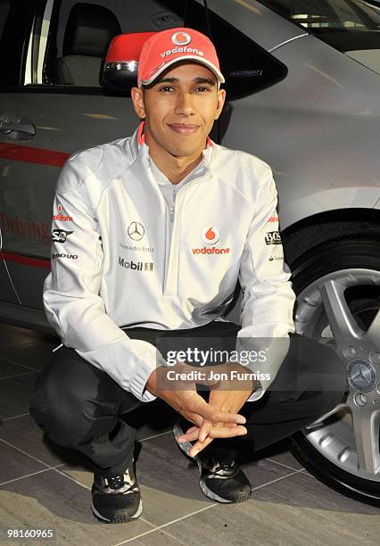 Lewis Hamilton attends a photocall to launch the Mercedes-Benz Driving Academy Roadsense schools initiative on December 6, 2009 in Weybridge, England.