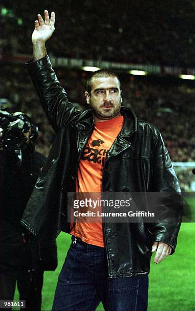 Fromer United player Eric Cantona on the pitch to receive an award before the match between Manchester United and Charlton Athletic in the FA Carling...