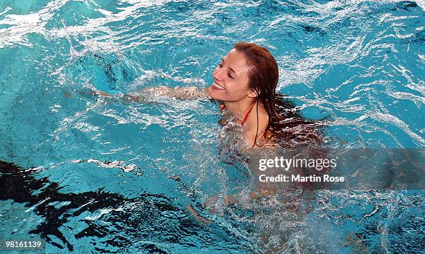 Susianna Kentikian of Germany swims during a training session at the Wandsbek swimming hall on March 31, 2010 in Hamburg, Germany. The WBA, WBO &...