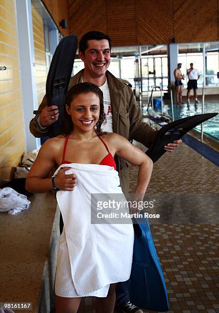 Susianna Kentikian of Germany pose with her coach Magomed Schaburow during a training session at the Wandsbek swimming hall on March 31, 2010 in...