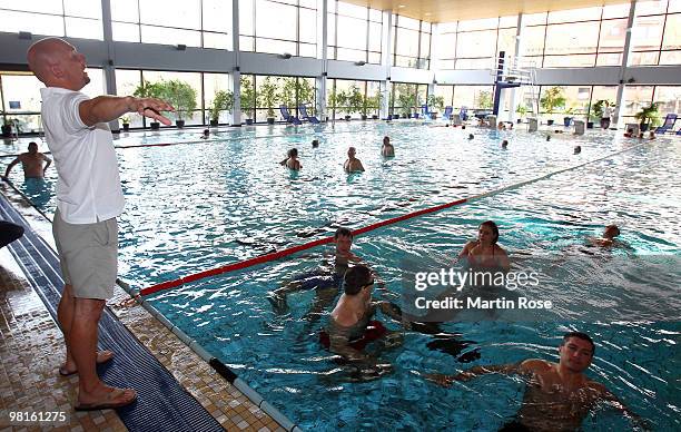 Dirk Lange , head coach of the german national swimming team talks to Eduard Gutknecht, Ruslan Chagaev, Dimitri Sartison, Susi Kentikian and Igor...