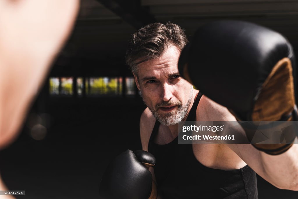 Man and woman in boxing training