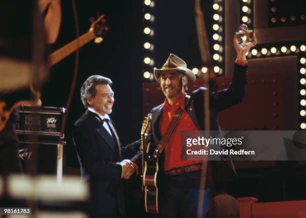 American music promoter Mervyn Conn with country singer Don Williams at the annual Country Music Festival at Wembley Arena, London, March 1982.