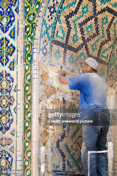 Uzbekistan. Madrasa at Registan in Samarkand. The 3 most famous madrasas in Samarkand are located in the square known as Registan .