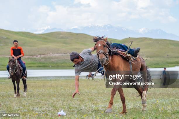 Kyrgyzstan. Osh Region. Nomadgames. Skill exercise in Gallop.