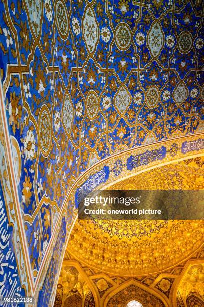 Uzbekistan. Madrasa at Registan in Samarkand. The 3 most famous madrasas in Samarkand stand in the square known as registan . Ornaments in a madrasah.