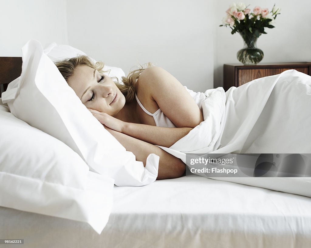 Woman sleeping in bed