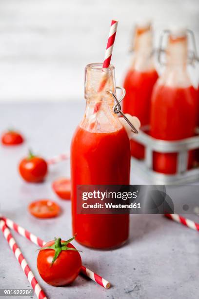 homemade tomato juice in swing top bottle - tomato juice stock pictures, royalty-free photos & images
