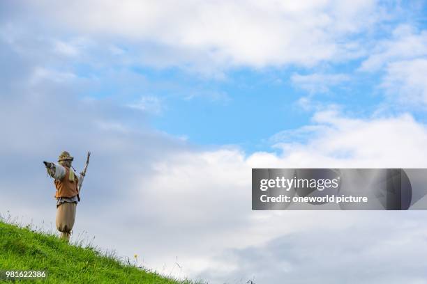 New Zealand. Waikato. Matamata. Scarecrow at Hobbiton movie set. Hobbiton. Movie set.