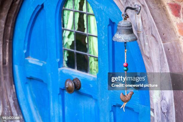 New Zealand. Waikato. Matamata. Entrance to a residential house in Hobbiton. Hobbiton. Movie set.