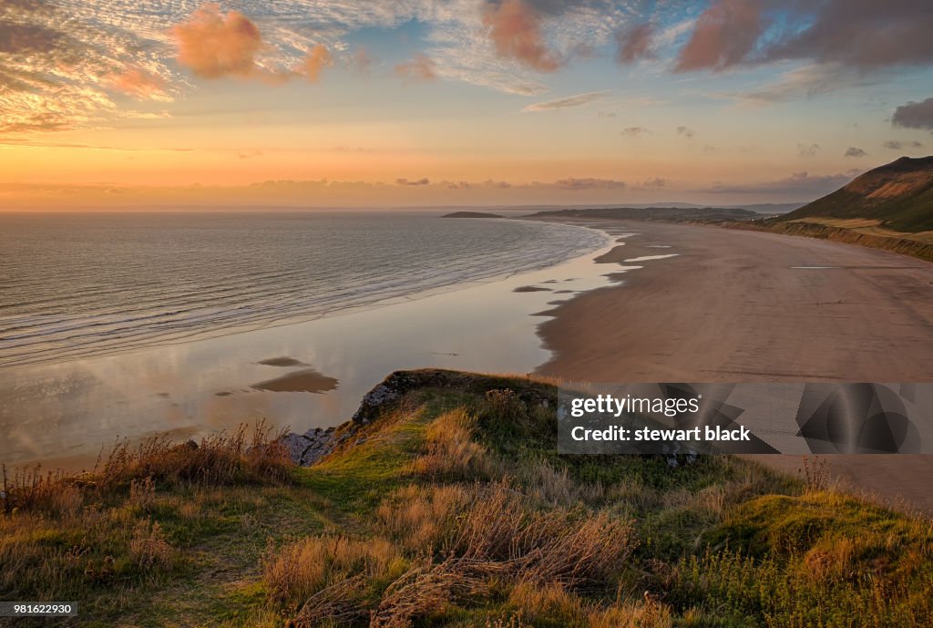 Beach at sunset, Rhossili, Gower, Wales, United Kingdom