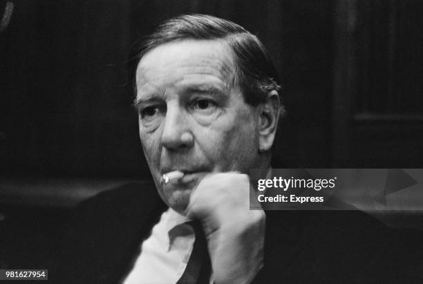 High-ranking member of British intelligence and double agent Kim Philby pictured while being interviewed by Daily Express correspondent Roy Blackman,...