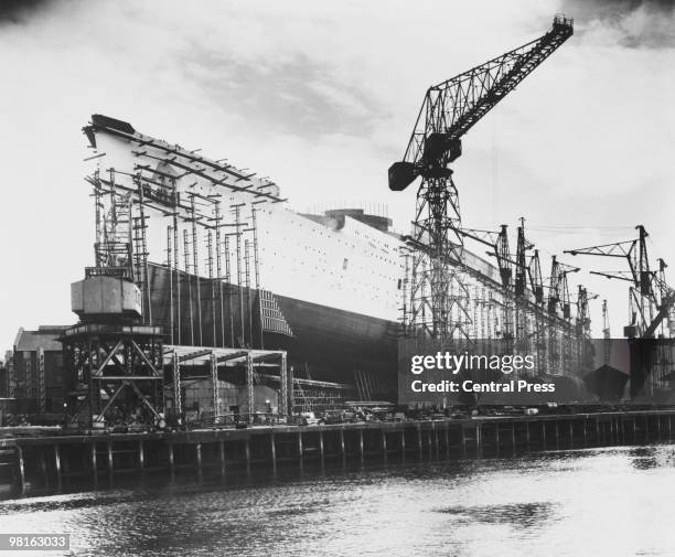 The new Cunard White Star liner '534', later the Queen Mary, during its construction at the John Brown & Co shipyard, Clydebank, Scotland, 1934.