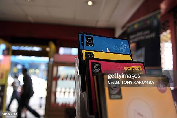 Zain store displays brochures of some of its products in the Kenyan capital, Nairobi on March 31, 2010 . Indian telecoms tycoon Sunil Bharti Mittal...