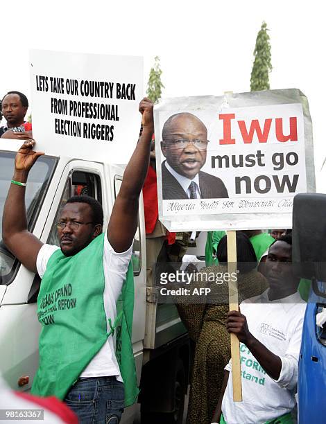 People take part in a protest organized by the Nigerian Labor Congress on March 31, 2010 in Abuja, calling for the removal of Independent National...