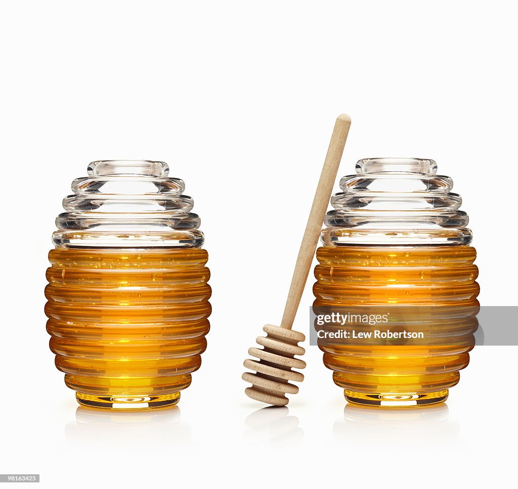 Two Honey Jars with dipper