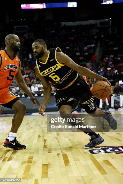 Alan Anderson of Killer 3s dribbles against Baron Davis of 3's Company during week one of the BIG3 three on three basketball league at Toyota Center...