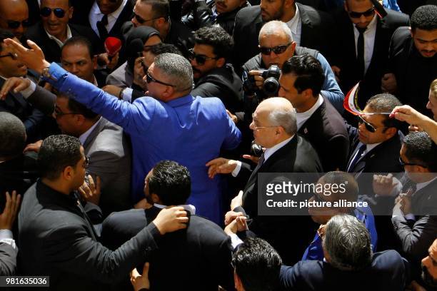 Egyptian Presidential candidate and leader of El-Ghad Party Moussa Mostafa Moussa arrives to cast his vote at a polling station on the 1st day of the...