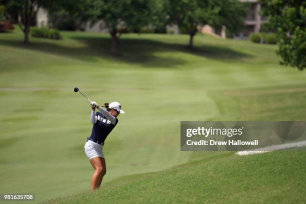 Minjee Lee of Australia plays an approach shot on the second hole during the first round of the Walmart NW Arkansas Championship Presented by P&G at...