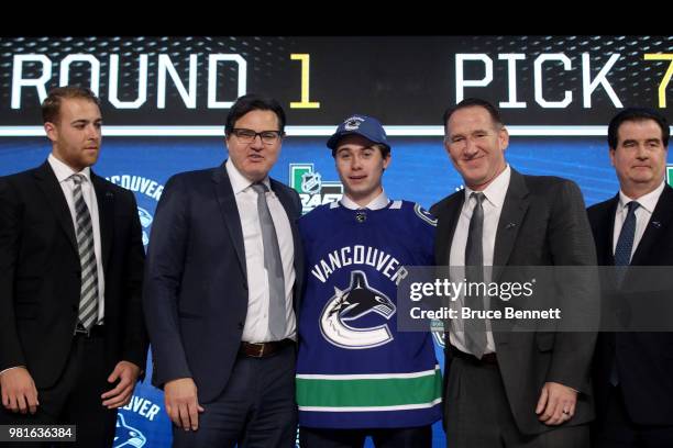 Quinton Hughes poses after being selected seventh overall by the Vancouver Canucksduring the first round of the 2018 NHL Draft at American Airlines...