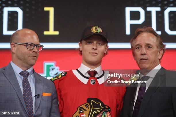 Adam Boqvist poses after being selected eighth overall by the Chicago Blackhawks during the first round of the 2018 NHL Draft at American Airlines...