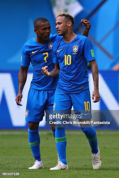 Neymar of Brazil celebrates with teammate Douglas Costa during the 2018 FIFA World Cup Russia group E match between Brazil and Costa Rica at Saint...