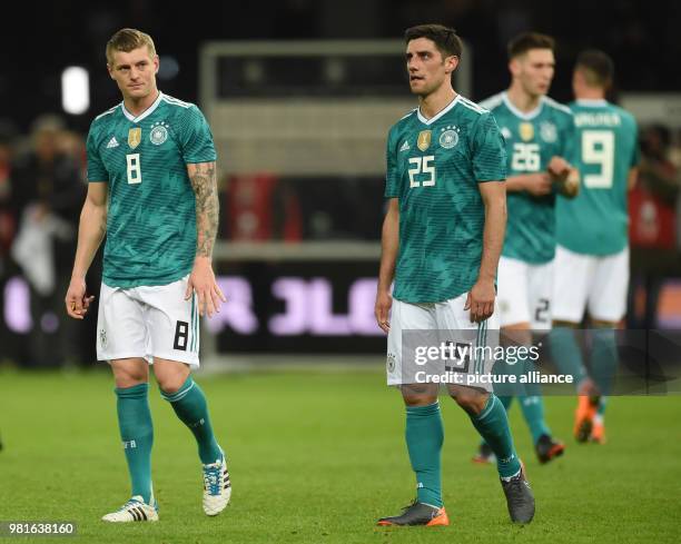 March 2018, Germany, Berlin, Olympia Stadium: Soccer, Friendly International match, Germany vs Brazil: Germany's Toni Kroos and Lars Stindl after the...