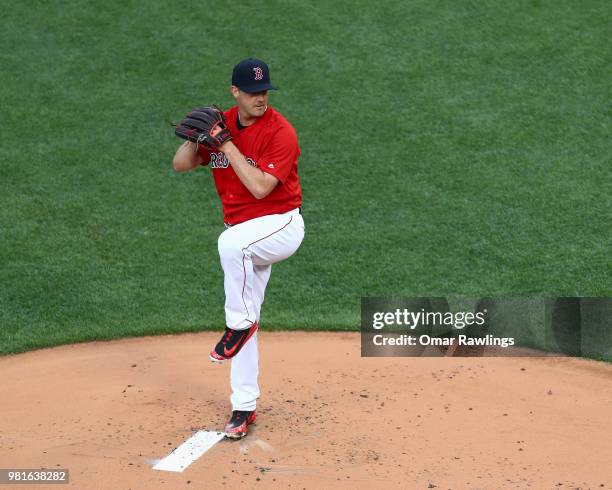 Steven Wright of the Boston Red Sox Pitches at the top of the of the first inning of the game against the Seattle Mariners at Fenway Park on June 22,...