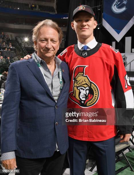 Brady Tkachuk poses for a photo with Ottawa Senators Eugene Melnyk after being selected fourth overall by the Ottawa Senators during the first round...
