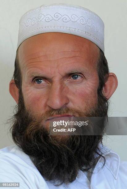 An Afghan elder listens during a Shora at Sar Hawza district chief bulding in Paktika province on March 31, 2010. A bomb attack in a crowded market...