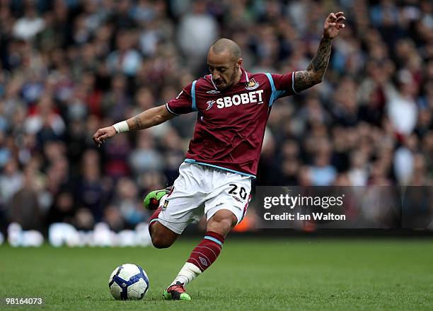 Julien Faubert of West Ham passes the ball during the Barclays Premier League match between West Ham United and Stoke City at the Boleyn Ground on...