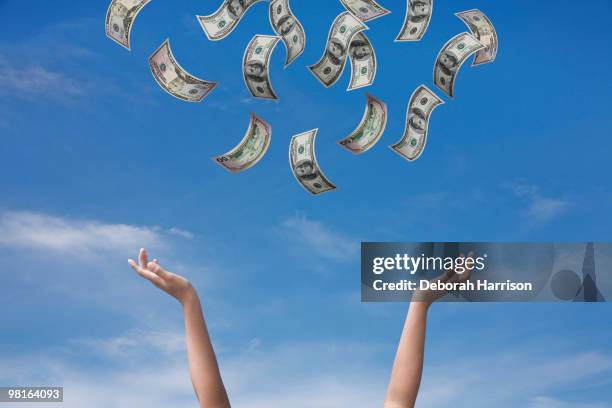 receiving abundance - throwing stock pictures, royalty-free photos & images